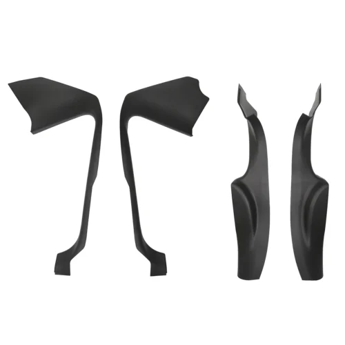 Set of black automotive exterior trim pieces laid out on white background (fender/side mirror area components)