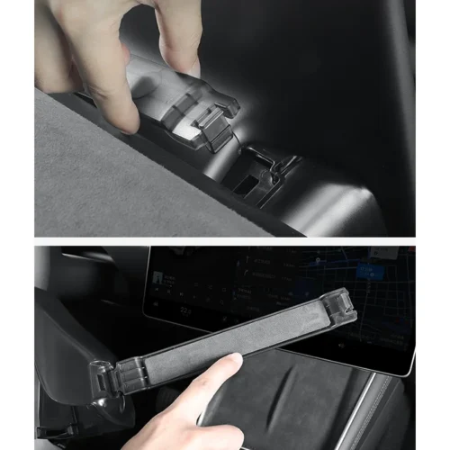 Close-up of a hand securing a car tablet mount with a locking latch inside a vehicle.