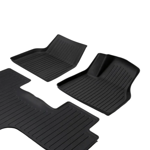 Set of black rubber car floor mats with ribbed grooves (front and rear liners).