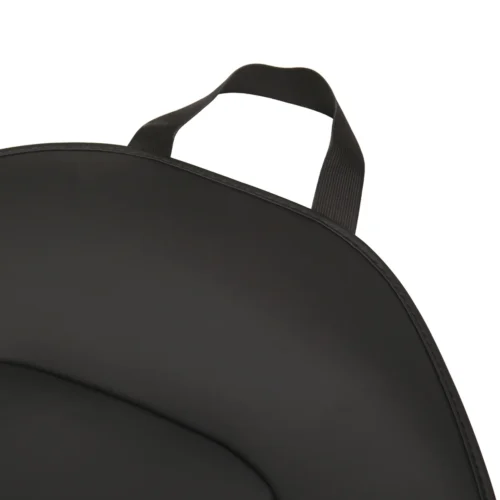 Close-up of a black circular bag showing a fabric carrying handle