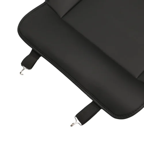 Close-up of a black padded bag corner with two metal hook straps attached to fabric loops