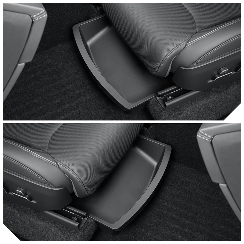Fold-out storage tray under a car seat in a dark gray interior.