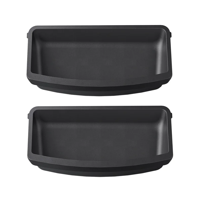 Two dark gray rectangular baking pans with rounded corners, stacked one above the other.