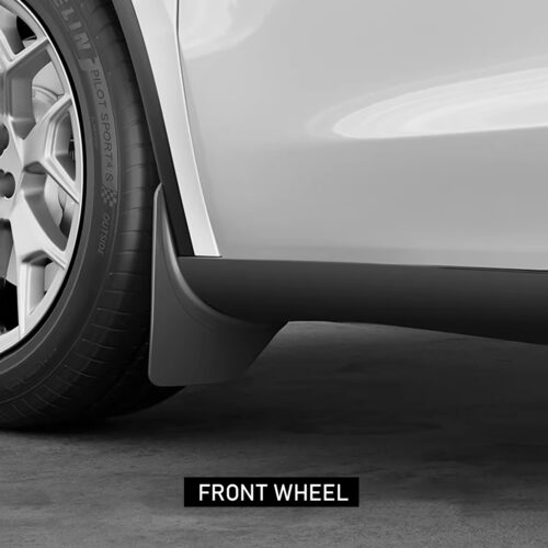 Close-up of a car's front wheel, tire, and lower body panel in grayscale, showing the wheel arch and side skirt gear.